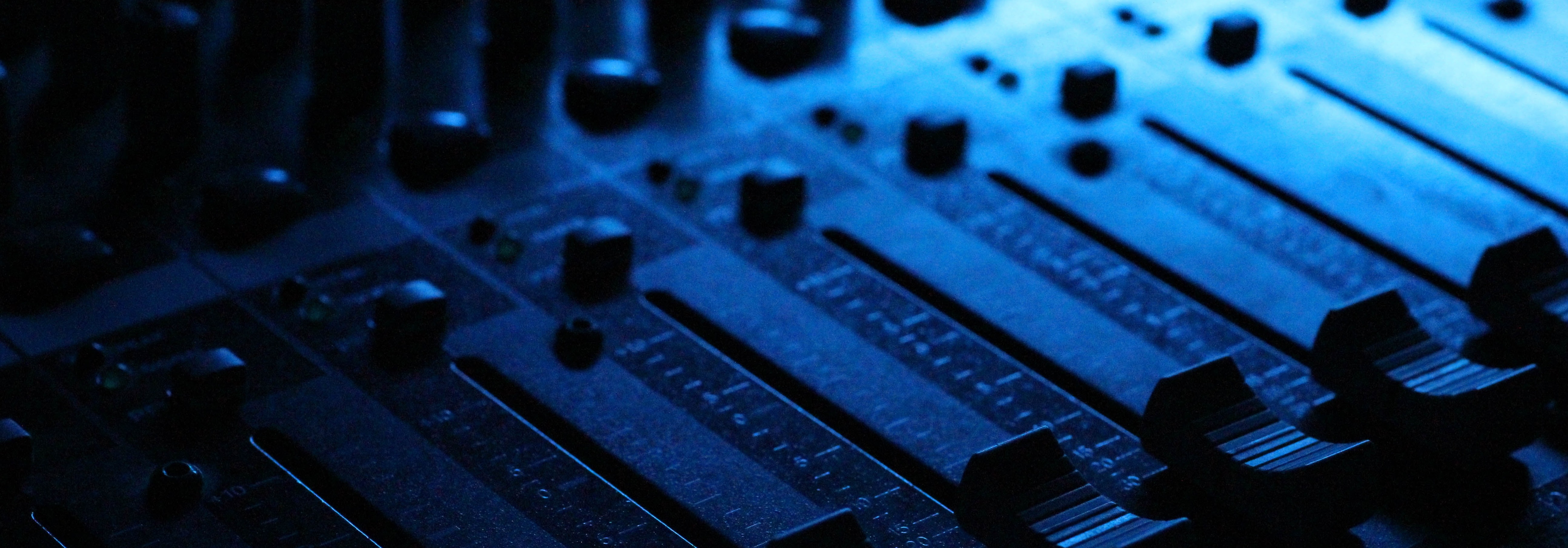 blue image of a close up view of a soundboard
