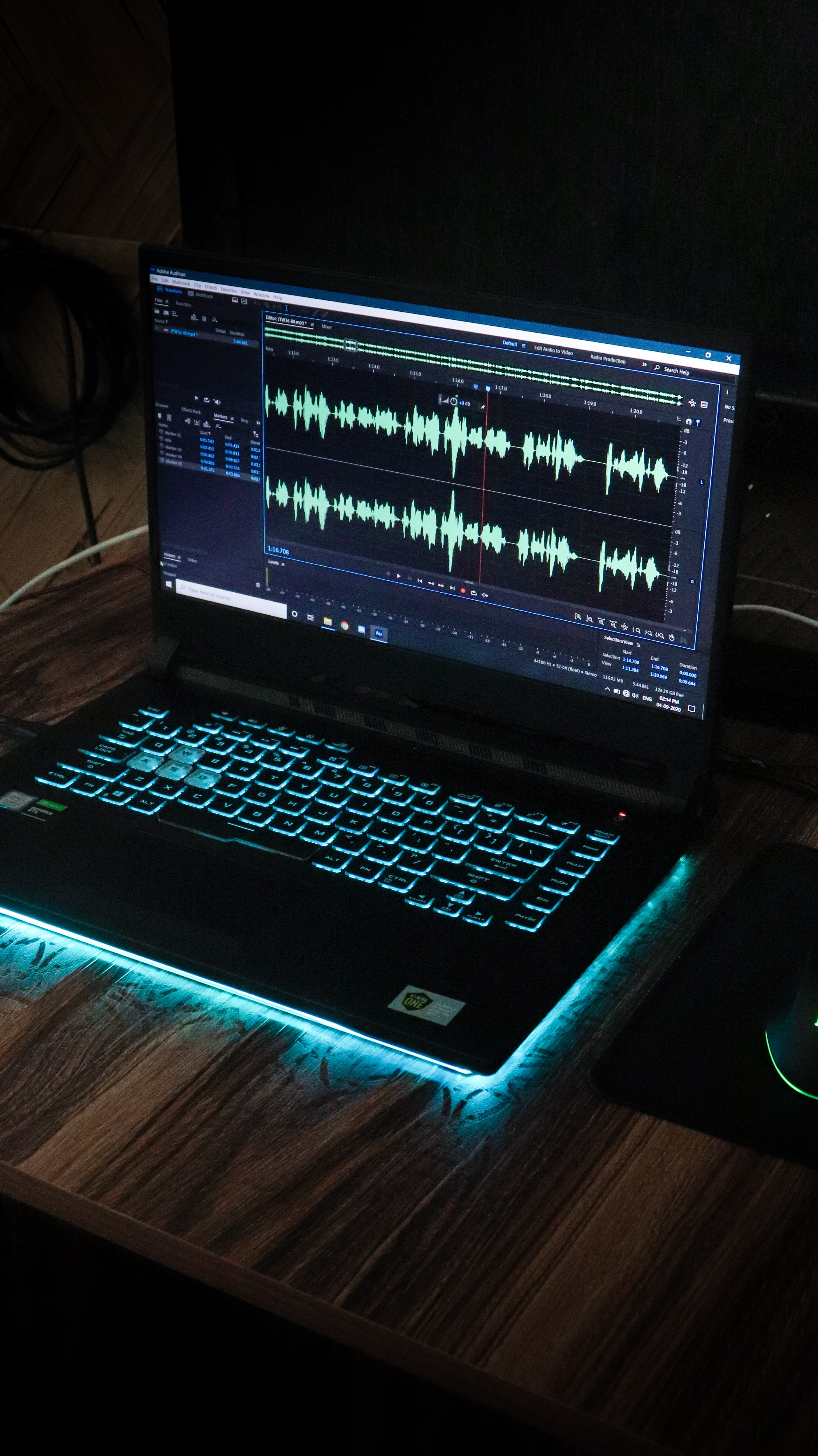 laptop with audio editing software